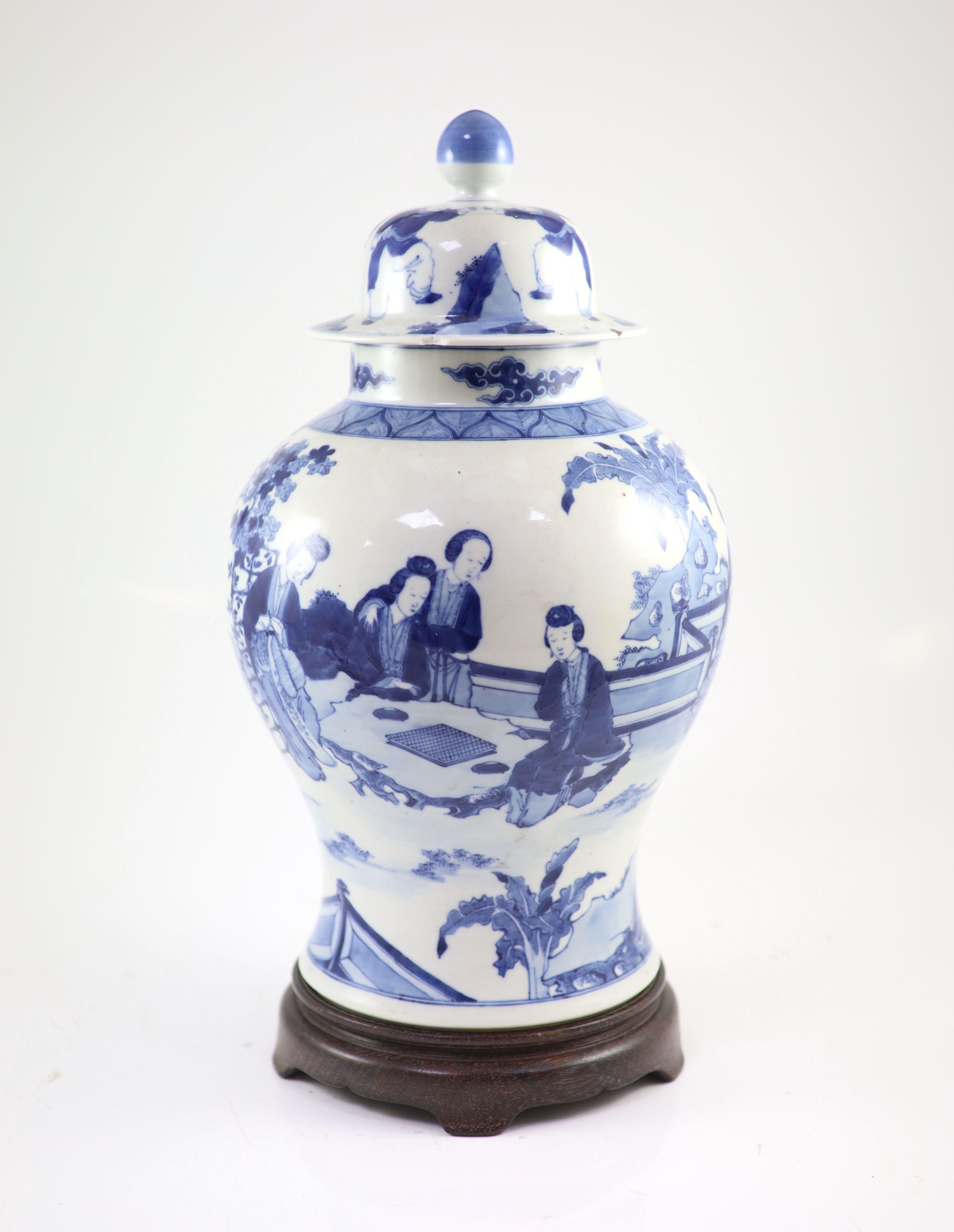 A large Chinese blue and white ‘ladies’ vase, Kangxi mark, 19th century, 44cm high, wood stand